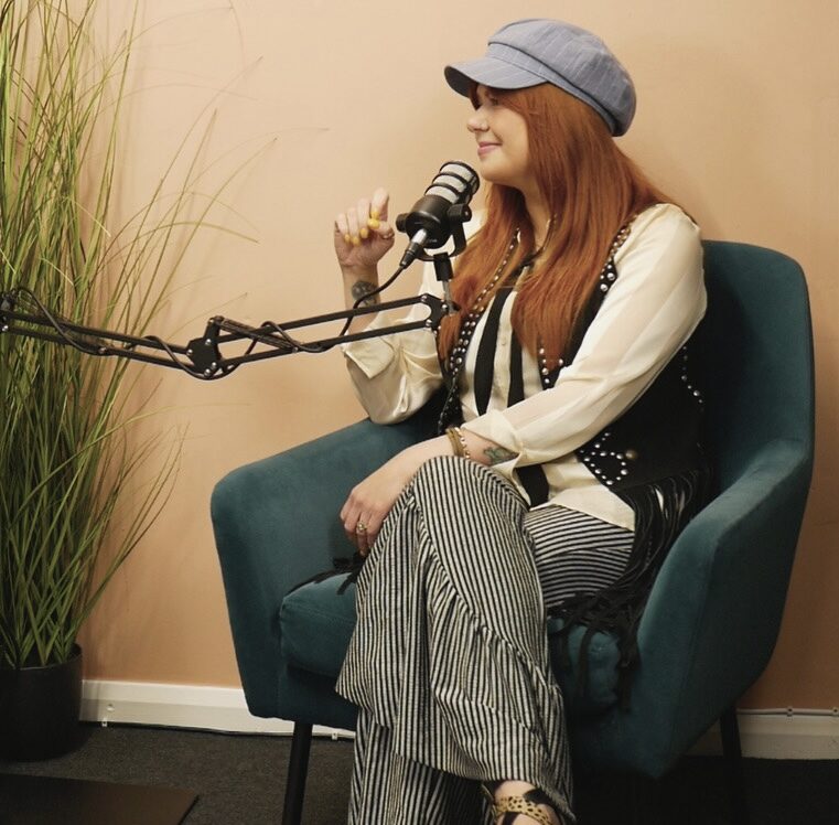 Podcast guest speaking into a microphone